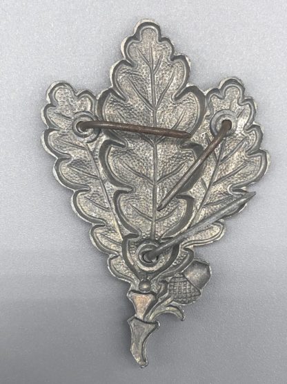 Jäger Oak Leaf Cap insignia Riverse
