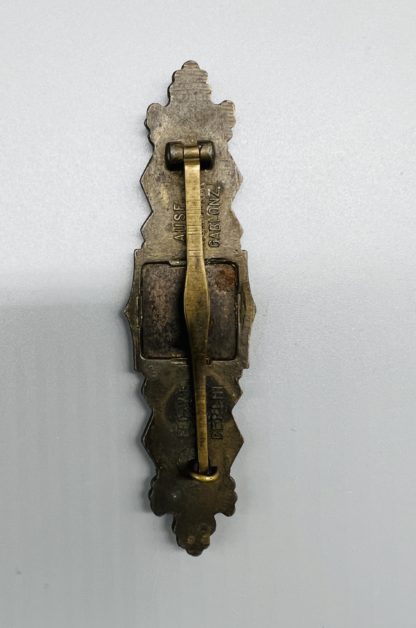 Close Combat Clasp In Bronze, reverse image with backing plate
