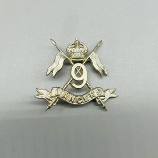 British 9th Queen's Royal Lancers Cap Badge, constructed in white metal.