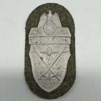 WW2 Heer Demjansk Shield By Deschler & Sohn, with backing cloth.
