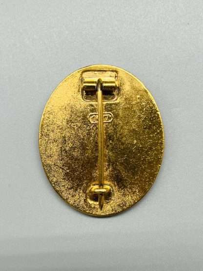Gold Wound Badge by Karl Wild, reverse stamped 107 with vertical pin assembley.