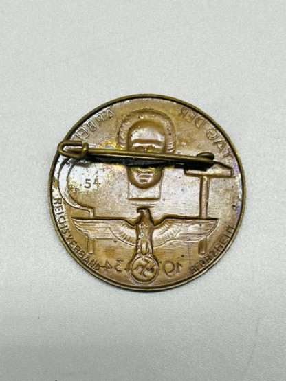 Third Reich National Day Of Labour Badge 1934, reverse image