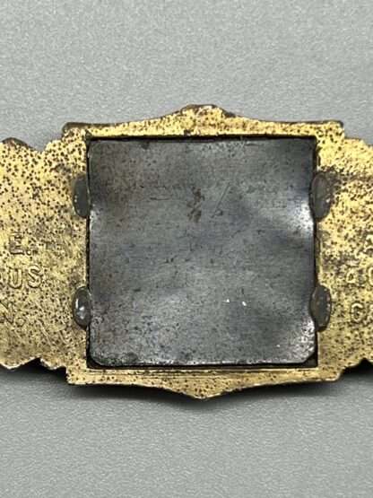 Close Combat Clasp In Bronze By Gablonz, reverse image of steel backplate.
