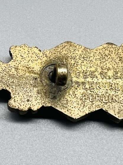 Close Combat Clasp In Bronze By Gablonz, reverse image on the clasp.