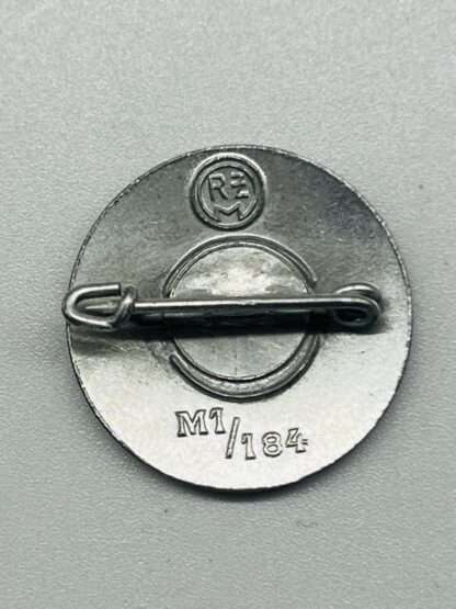 An NSDAP Party Badge marked on the reverse RZM M1/184