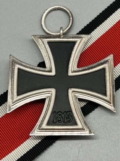 A WW2 German Iron Cross 2nd Class By Klein & Quenzer Marked 65 on the medal ring, reverse image.