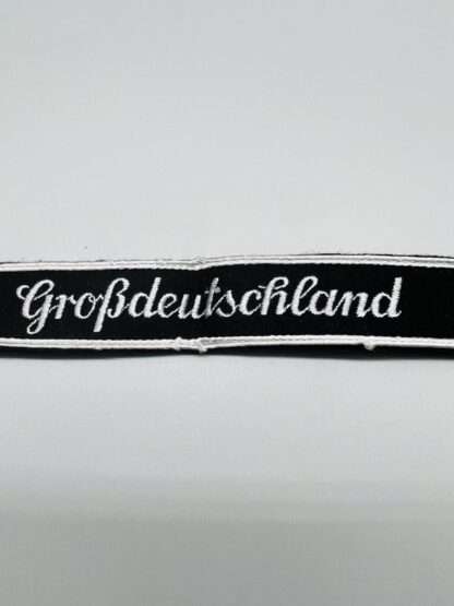 WW2 German Großdeutschland Cuff Title, embroidered on black woolen backing.