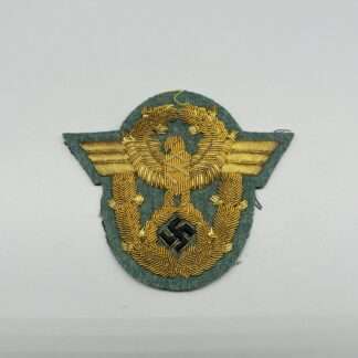 German Schutzpolizei Officers Sleeve Eagle Badge, hand embroidered in gold bullion.