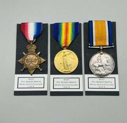 A Great War Trio Set of Medals Awarded To PTE R Martin RS FUS reverse image.