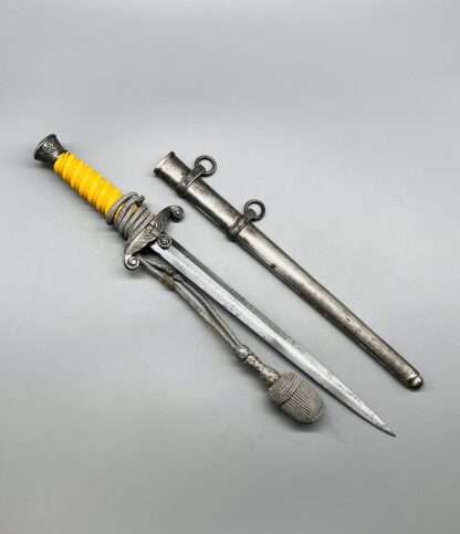 A WW2 Heer Officer’s Dress Dagger with scabbard, and portepee.