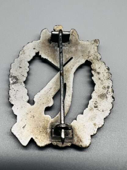 A WW2 German Infantry Assault Badge Silver By Gottlieb & Wagner, reverse image with crimped set-up.