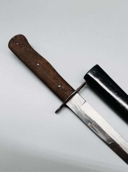 A WW2 German Luftwaffe Combat Boot Knife, with scabbard.