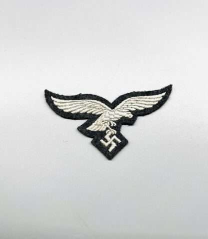 A Luftwaffe EM/NCOs Breast Eagle, machine embroidered.