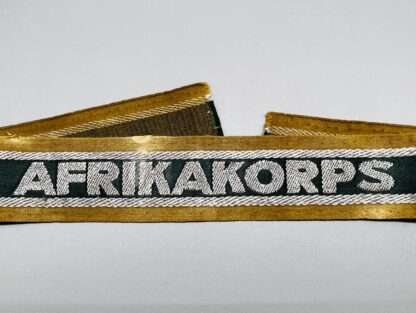 A WW2 German AfrikaKorp Cuff Title, machine embroidered.