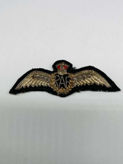 A Pre WW2 Royal Air Force WW2 Pilot's Wings constructed in gold, red, and silver bullion.