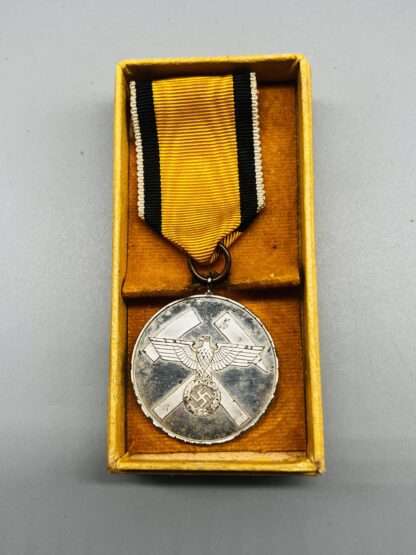 A Scarce WW2 German Mine Rescue Honour Medal with yellow presentation case.