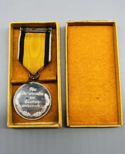A Scarce WW2 German Mine Rescue Honour Medal with yellow presentation case, with felt lining.