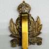 A reverse image of a Intelligence Corps Cap Badge, brass slider.