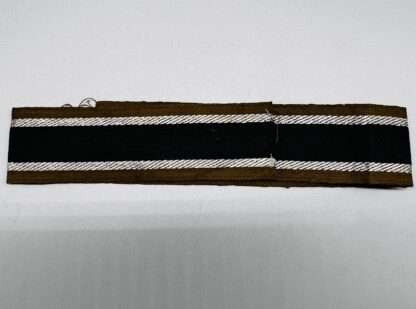 A WW2 German Army AfricaKorp cuff title, machine embroidered with silver aluminum wire.