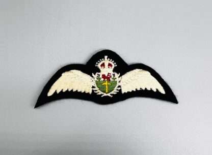 A rare WW2 Royal Rhodesian Air Force Pilot Wings, embroidered with outstretched wings padded.
