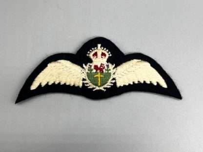 A rare WW2 Royal Rhodesian Air Force Pilot Wings, embroidered with outstretched wings padded.