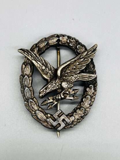 Luftwaffe Air Gunner and Radio Operators Badge, silver-colored zink wreath and tombak eagle clutching lighting bolts