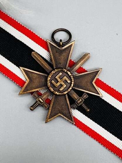 A WW2 German War Merit Cross with swords 2nd class, with original medal.