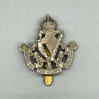 A WW2 British 8th (Irish) Battalion the King's Liverpool Regiment Cap Badge, constructed from white metal.