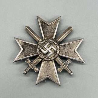 A WW2 German War Merit Cross 1st Class, with silver wash.