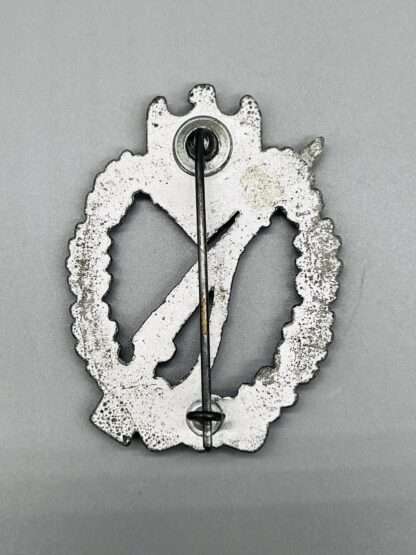 A reverse image of an Infantry Assault Badge Silver, unmarked but attributed to Josef Bergs & Co, constructed in zinc.