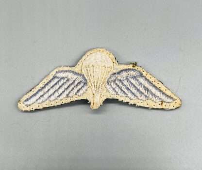 A reverse image of a WW2 British Army Paratrooper Cloth Jump Wings.