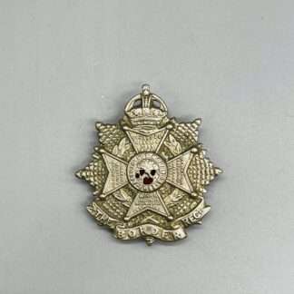A WW2 Border Regiment Cap Badge, constructed in white metal.