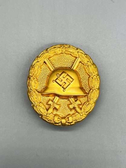 A scarce WW2 German Wound Badge Gold 1st Pattern, with gilt finish.