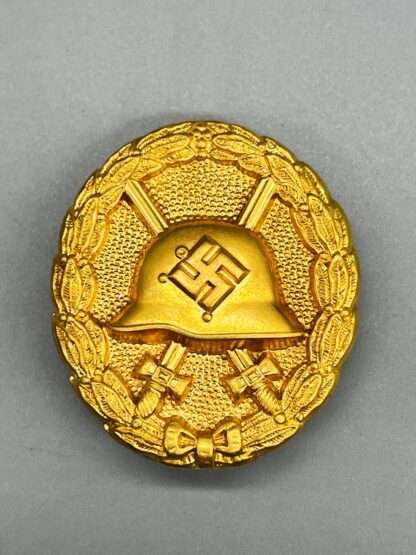 A scarce WW2 German Wound Badge Gold 1st Pattern, with gilt finish. 