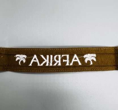 Reverse photo of original WW2 German Heer Afrika Korp cuff title, machine embroidered.
