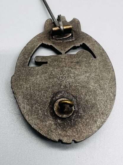 A Panzer Assault Badge Bronze marked FLL 43, with soldered catch.