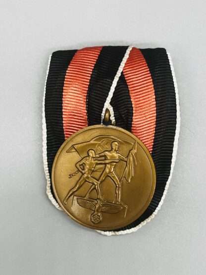 A WW2 German Sudetenland Medal court mounted with original ribbon.