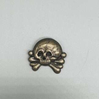 A Panzer Collar Tab Skull, constructed in nickle.