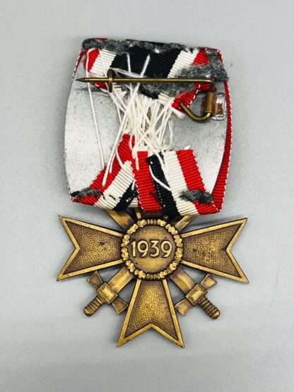 A reverse image of a War Merit Cross with swords 2nd class court mounted,