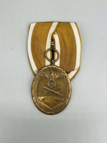 A WW2 German West Wall Medal Court Mounted, with original ribbon.