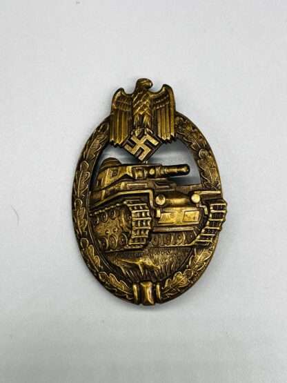A very early WW2 Panzer Assault Badge Bronze by Karl Wurster, constructed in tombak.