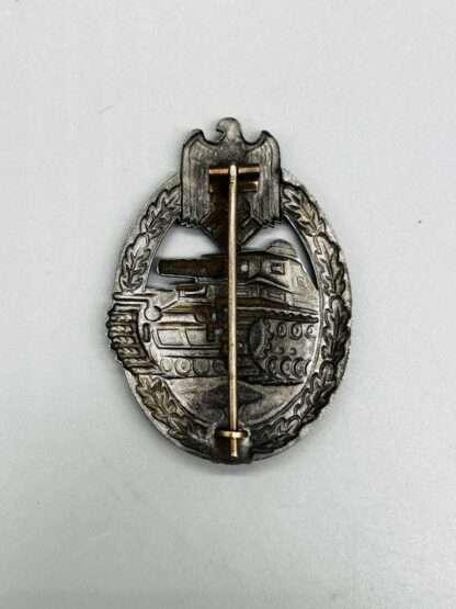 A reverse picture of a WW2 Panzer Assault Badge Bronze By Otto Schickle, constructed in tombac.