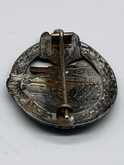 A reverse picture of a WW2 Panzer Assault Badge Bronze By Otto Schickle, constructed in tombac hollow back.