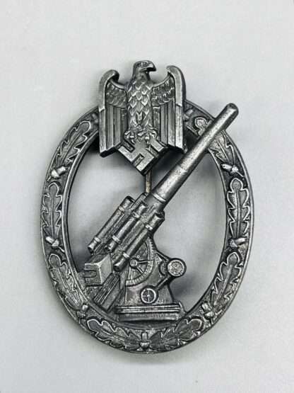 A WW2 Heer Flak Badge by Steinhauer & Lück, constructed in zinc.