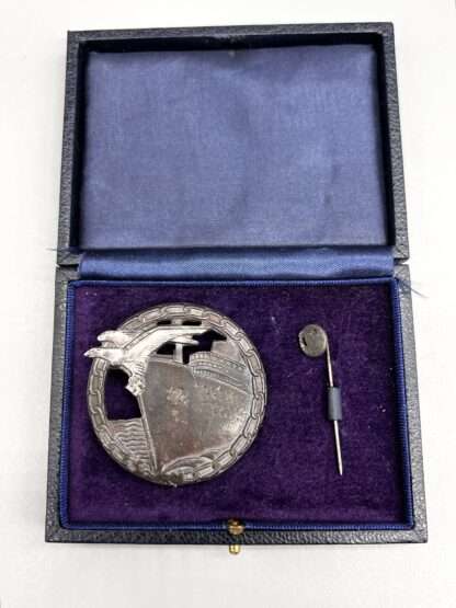 A German Blockade Runners Badge With makers mark By Fec. Otto Placzek, and stickpin with reproduction case.