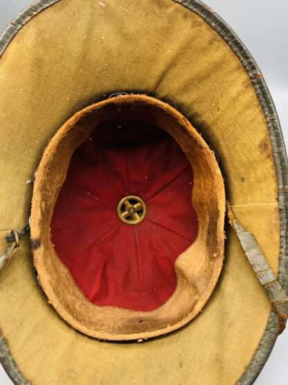 A WW2 German Heer Afrika Korp pith helmet red liner.