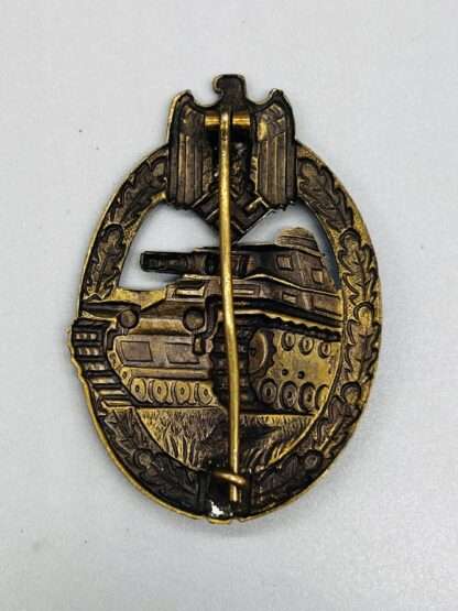 A WW2 German Panzer Assault Badge Bronze Hollow Back By Wurster, with vertical pin.