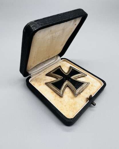 A Iron Cross EK1 By Rudolf Souval with black presentation case with lid open.