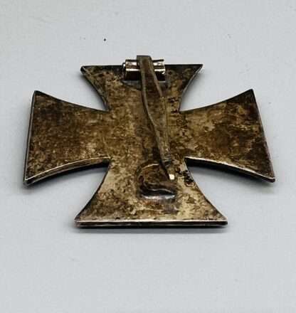 A reverse image of Iron Cross EK1 By Rudolf Souval, Wein with fluted pin and block barrel hinge.