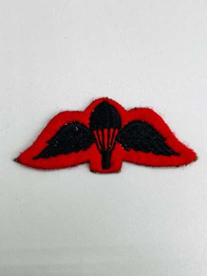 British Gurka Para Wings in black thread on red woollen backing.